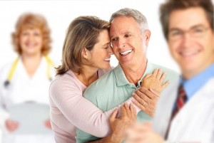 doctor and elderly couple