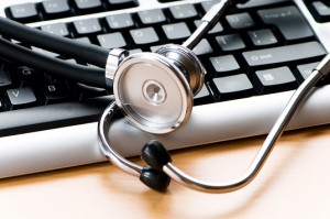 Stethoscope and keyboard illustrating concept of digital securit