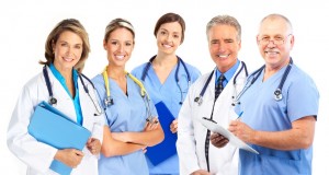 Smiling medical doctors with stethoscopes. Isolated over white background