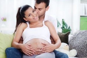 Young happy Couple expecting baby