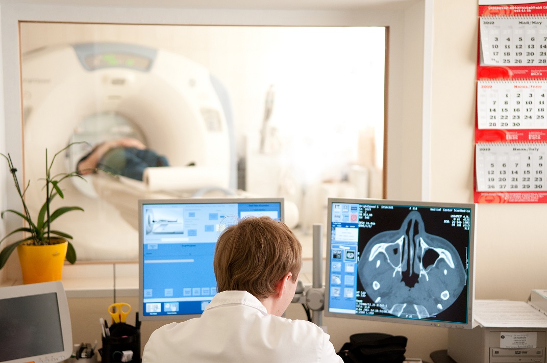 computer tomography diagnostics, doctor working with films
