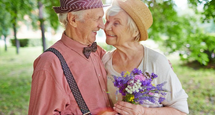 Happy elderly couple in love enjoying summer day together